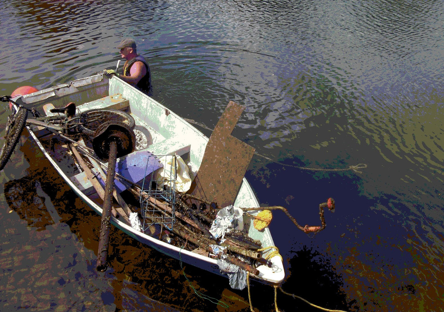 doug-snedden-with-a-boat-full-of-waste